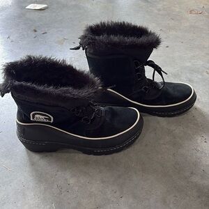 Sorel waterproof snow boots.